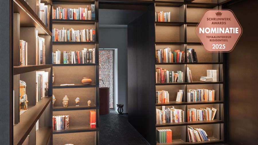 Bibliotheek met verborgen deur als technisch hoogstandje